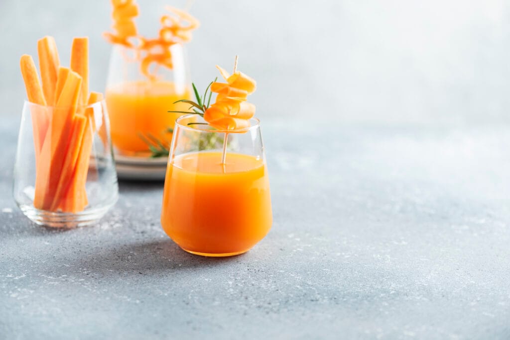 Glass of fresh carrot juice