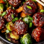 Korean BBQ Meatballs and Vegetables 5 Meatballs beside Roasted Vegetables like charred brussels sprouts and caramelized sweet potato cubes, showcasing Korean BBQ Meatballs and Vegetables
