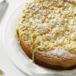 Close up slice of Vegan Pistachio Coffee Cake with pistachio cream glaze, moist crumb