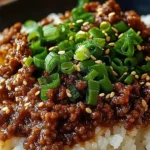 Korean Ground Beef Bowl over steamed rice topped with green onions and sesame seeds, an easy weeknight dinner with sweet savory sauce