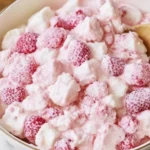 Strawberry Shortcake Fluff Salad 5 Bowl of Strawberry Shortcake Fluff Salad with whipped cream, Cool Whip, strawberries, and angel food cake cubes, a no bake dessert perfect for potlucks.