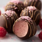 Decadent Chocolate Raspberry Truffles on a decorative plate
