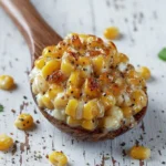 Creamy honey butter skillet corn dish served in a pan.