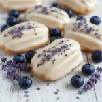 Vegan Blueberry Lavender Madeleines on a platter, showcasing their vibrant colors