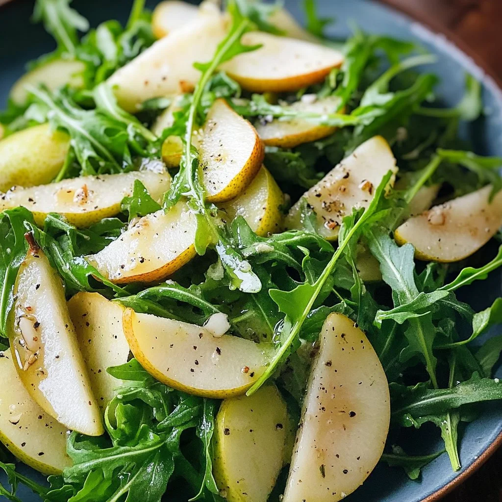 Delicious Arugula Pear Salad with fresh ingredients and vibrant colors